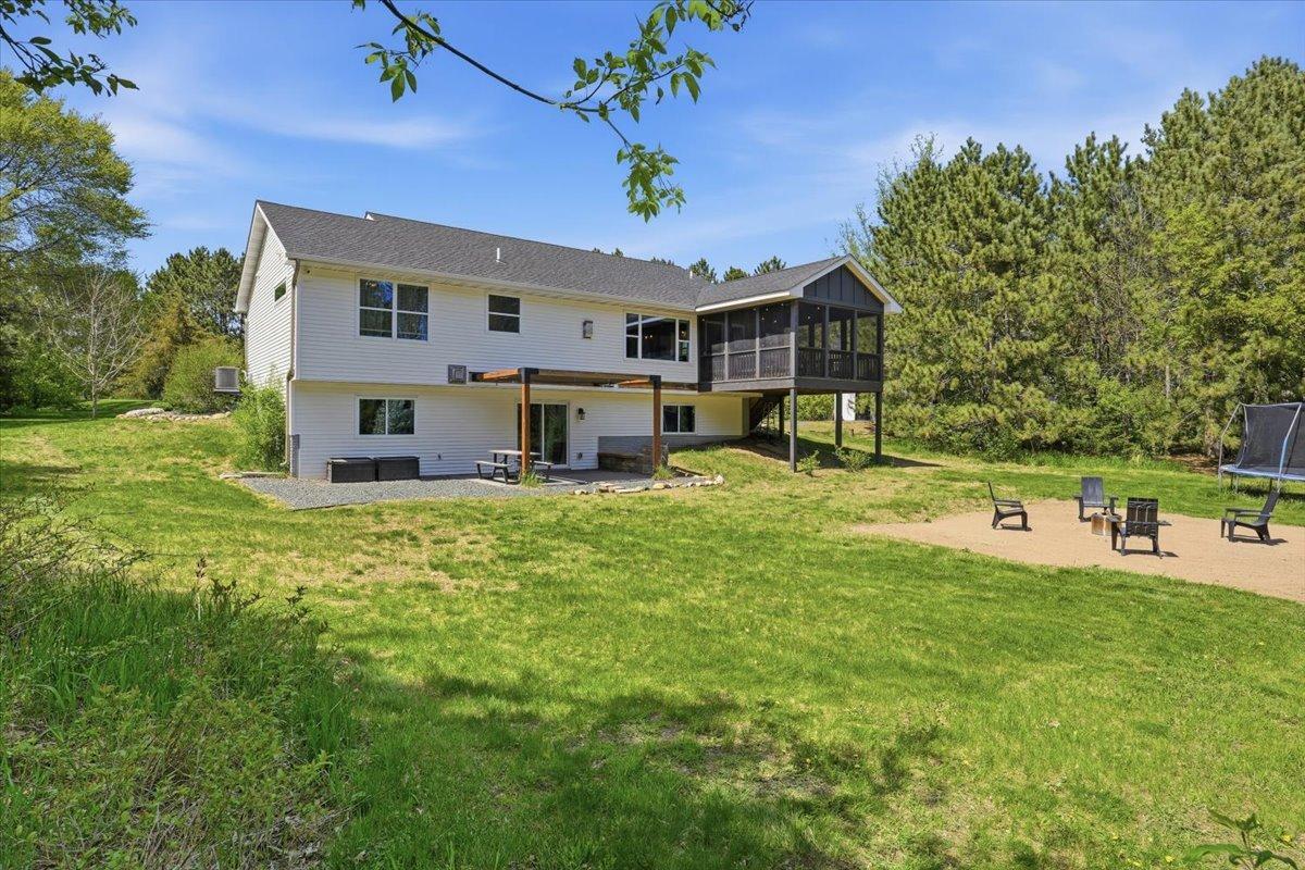 A backyard great for entertaining and enjoyment with trails mowed through the trees. This property offers a bit of everything for everyone