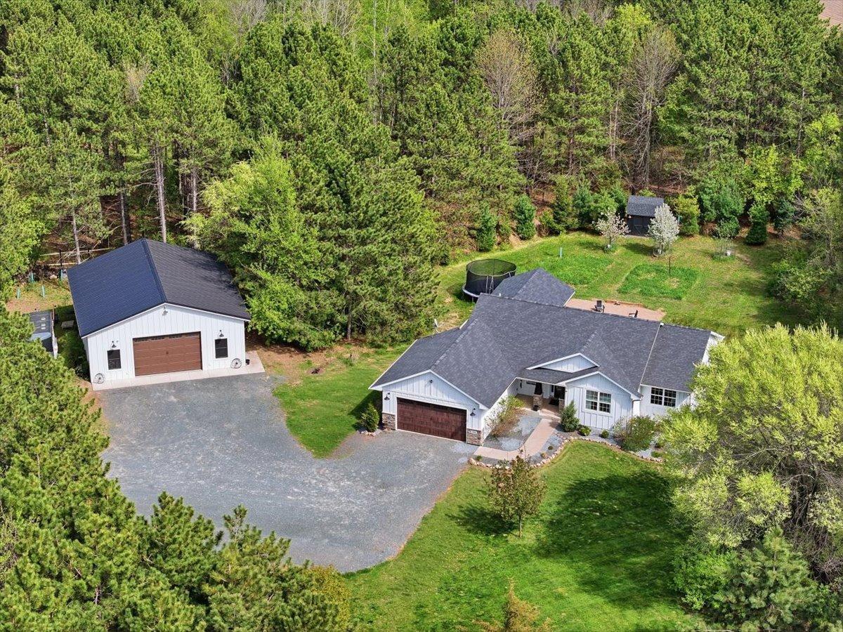 With these stunning pines never shedding their leaves, the privacy never ends here no matter the time of year