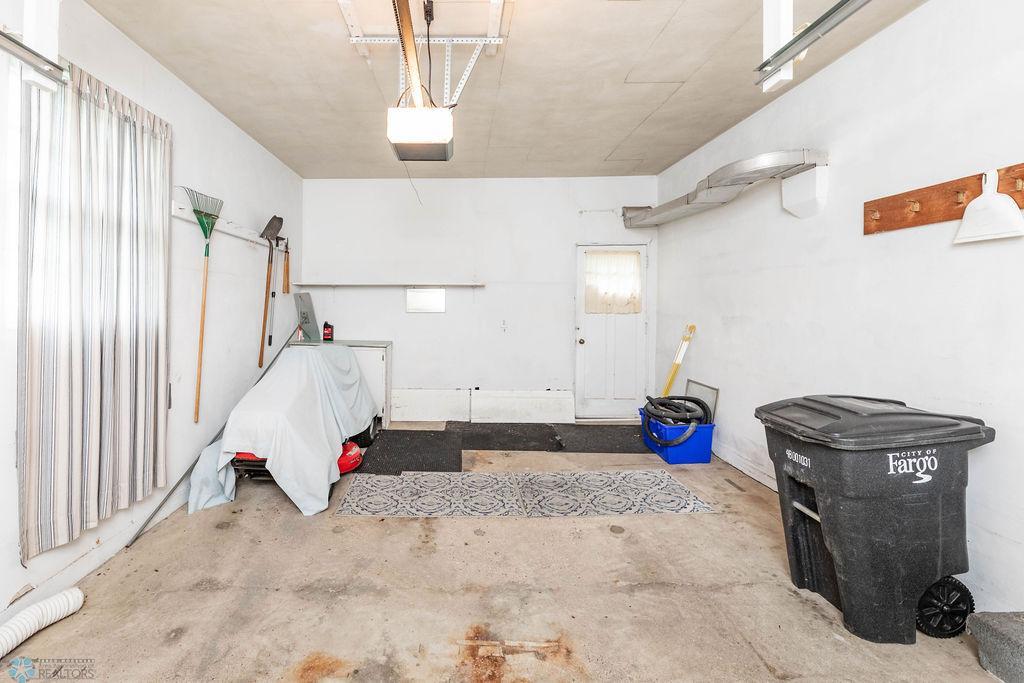 Garage access to backyard.