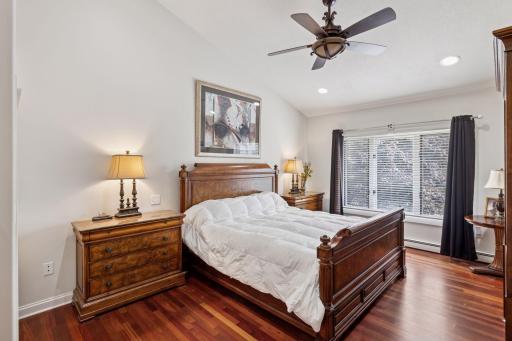 Vaulted primary suite with dual closets-one in the bedroom and one in the bathroom.