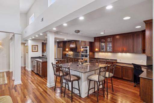 Welcome to 3150 Glen Oaks Ave #311A. This is truly a one-of-a-kind condo in the Lakewood Village building that has been completely renovated and offers an elevated living experience.