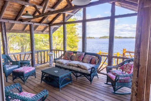 Large screened in porch on main cabin