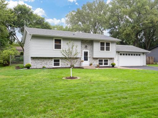 Welcome home to 13041 Union Terrace Ln N! Big-ticket updates already done for you— Roof, Seamless steel siding, exterior stone, gutters & garage door (2021)