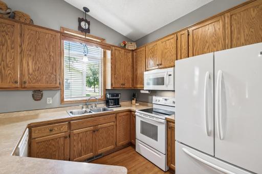 Crisp white appliances create a bright touch in this space.