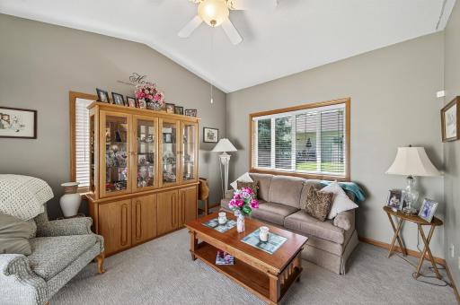 Imagine sipping a cup of coffee in this sun filled space. Vaulted ceilings and lots of natural light.