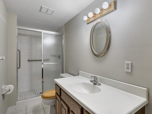 The lower level 3/4 bath has a tiled walk-in shower!