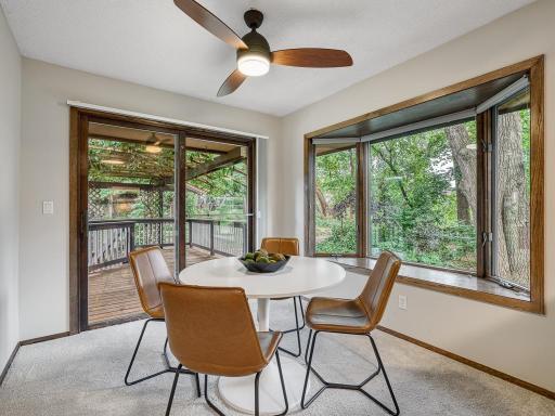 Beautiful informal dining area with easy access to the stunning deck!