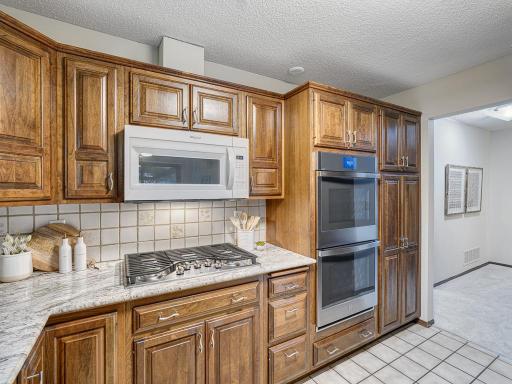 The new gas cooktop and double ovens will make cooking a breeze!