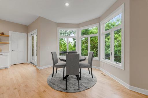 Just off the kitchen, the bright and airy informal dining room is filled with natural light and offers direct access to the expansive wraparound deckâideal for effortless indoor-outdoor entertaining.