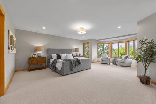 Retreat to the spacious upper-level primary suite, featuring brand-new plush carpeting, dual walk-in closets, and a cozy double-sided fireplace that adds warmth and charm.