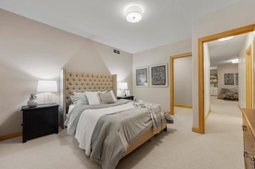 Also on the lower level, Bedroom Six offers a generous walk-in closet and fresh new carpeting.