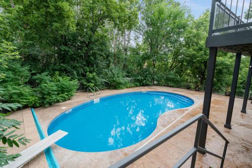 Embrace outdoor living at its finest with a beautifully renovated backyard oasis. The private in-ground heated pool features a brand-new liner.