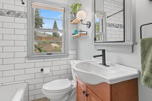 The main level full bath is picture perfect
