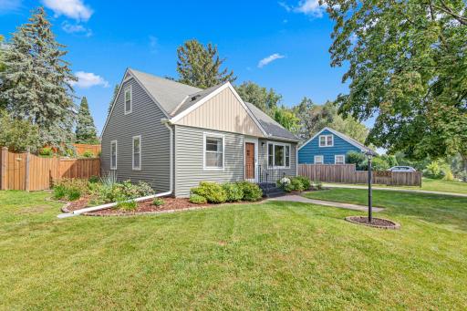 A huge front yard boasts stunning curb appeal