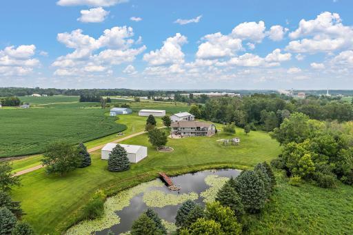 13 Acres (with additional acreage available) of pristine country living with numerous outbuildings & 4000 sq ft home