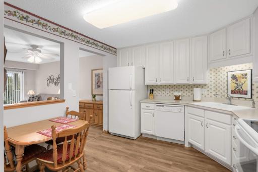 A cozy nook within the kitchen offers the perfect spot for morning coffee or quick meals