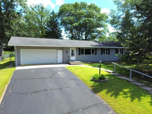 2 garages, 4 BR, 2 bath home on corner lot