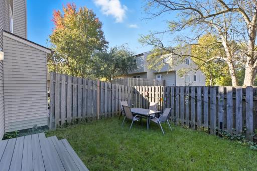 Walk out to the fenced yard area ideal for pets and Summer Bar-B-Ques