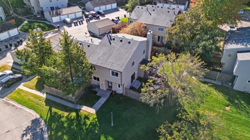 Overhead view of end unit and fenced yard