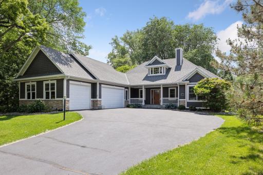Welcome to 974 County Rd C East nestled on a beautiful lot backing up to a wetland area and seasonal views of Kohlman Lake out the front.