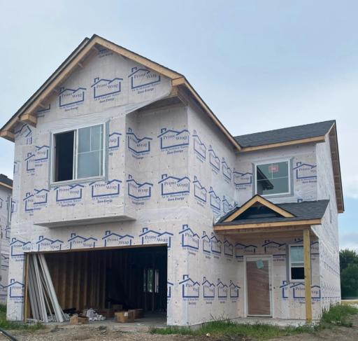 3212 Kady Ave NE- Photo of home progress offering an estimated October move-in! Siding and stone accents will be installed soon.