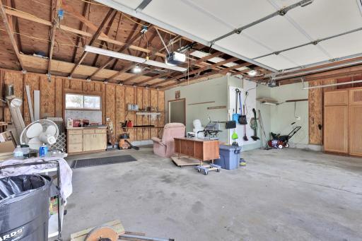 3 Car Garage - Large Cabinet to the right will stay - snowblower will stay