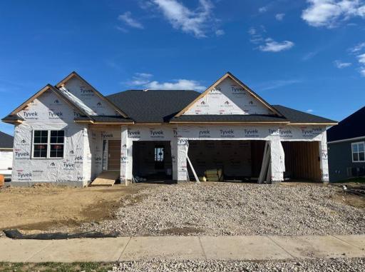 This home offers over 2000 square feet on the main level, finished walkout basement, stunning kitchen and owner's suite as well as a 4 car garage! Located in the exclusive Legacy Woods Community.