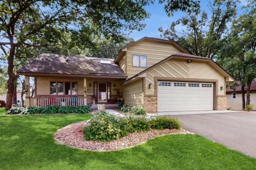 This spacious Modified 2 story is beautiful inside and out