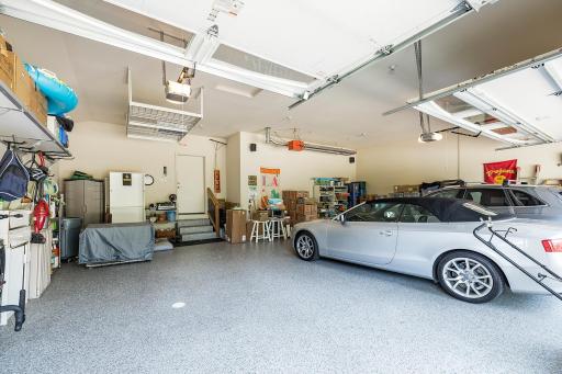 Exceptional Three Car (They have 4 cars in at times) Garage with Well Planned Storage Areas - HEATED GARAGE