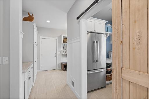 Mud Room Off Garage with Built-Ins and Counters