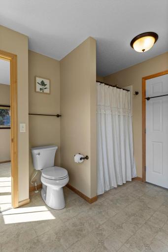 The walk-through bathroom includes a separate shower and jetted tub.