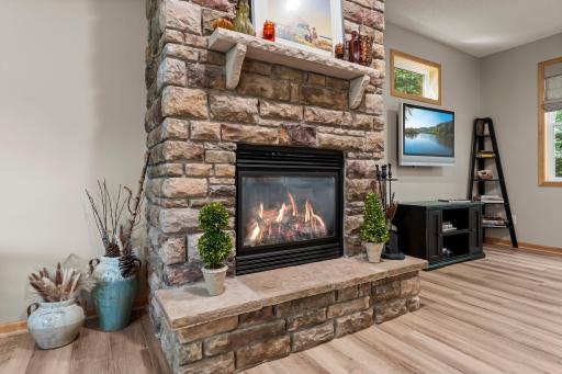 The fireplace is the perfect centerpiece for the living room.