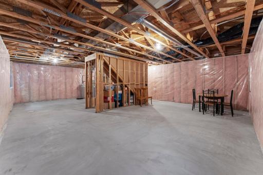 The lower level is unfinished, offering the opportunity to build instant equity!