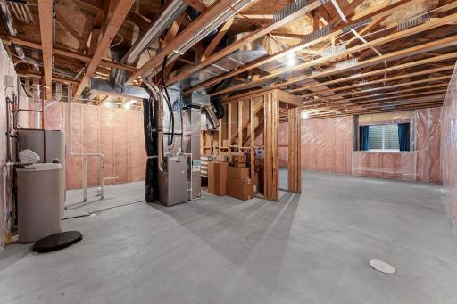 The lower level is unfinished, offering the opportunity to build instant equity!