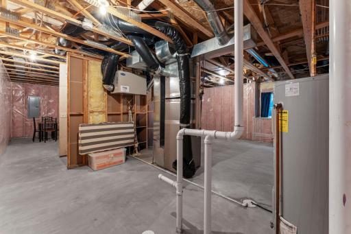 The lower level is unfinished, offering the opportunity to build instant equity!