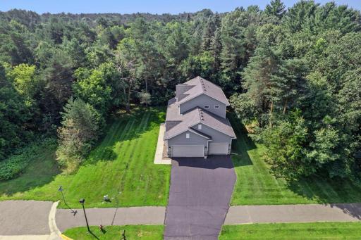 This neighborhood is surrounded by mature trees.