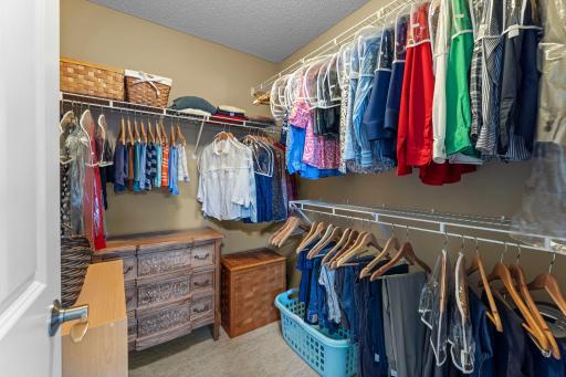 The primary bedroom includes a large walk-in closet and a walk-thru bathroom.