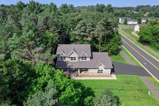 This neighborhood is surrounded by mature trees.