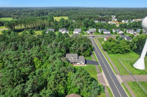 This neighborhood is surrounded by mature trees.