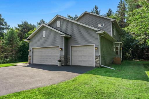 This home features an asphalt driveway and a 3-car garage.