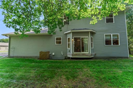 The heavily wooded lot offers both shade and privacy.