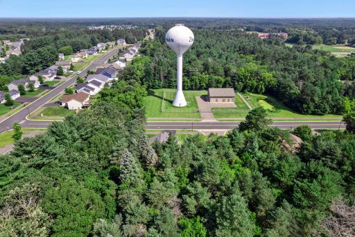 This neighborhood is surrounded by mature trees.