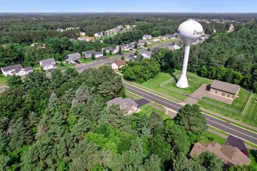 This neighborhood is surrounded by mature trees.