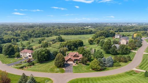 WOW! Impressive Executive Walkout 2 Story on 1.5 beautiful scenic Acres in Cambria Farms!