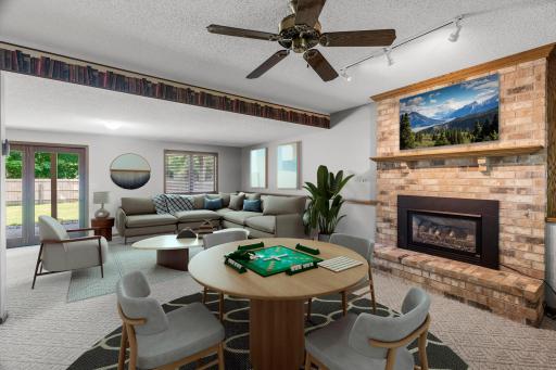This photo has been virtually staged to show potential. Lower level family room.