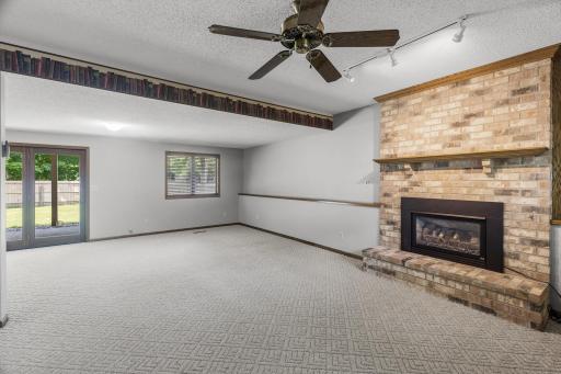 Lower level family room with gas fireplace