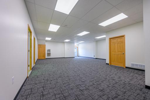 First floor features a spacious lobby area with new carpet (2024.)