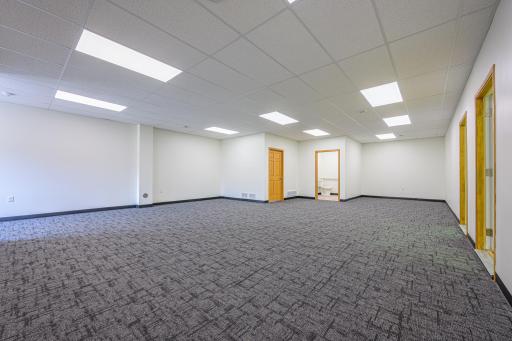 First floor features a spacious lobby area with new carpet (2024.)