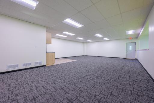 The mezzanine has a kitchenette and could be used for office, hosting groups/ parties, or other fitness concepts.