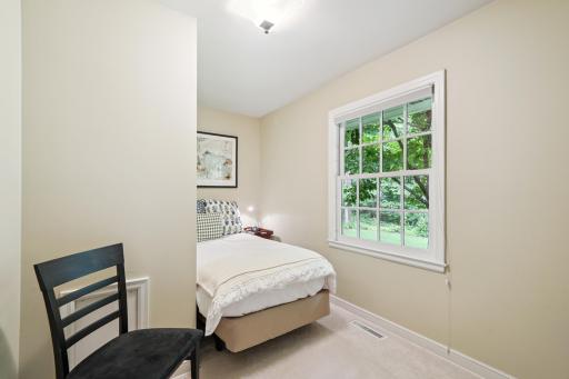 Cozy Main Floor Bedroom with Laundry out the Door